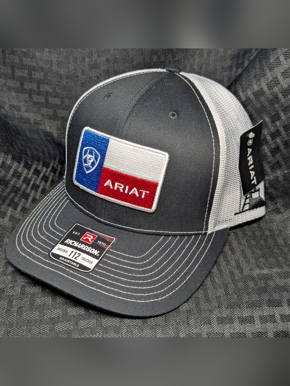 Ariat Men's Black and White Mesh Logo Patch Trucker Cap.